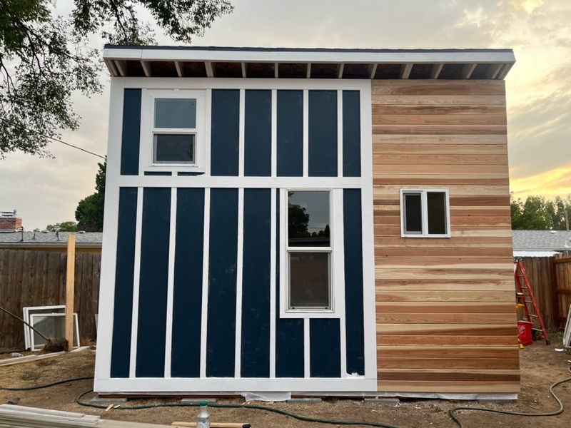 Wood tongue and groove paneling, fiber cement siding and trim